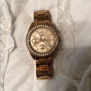 Rose gold fossil watch.